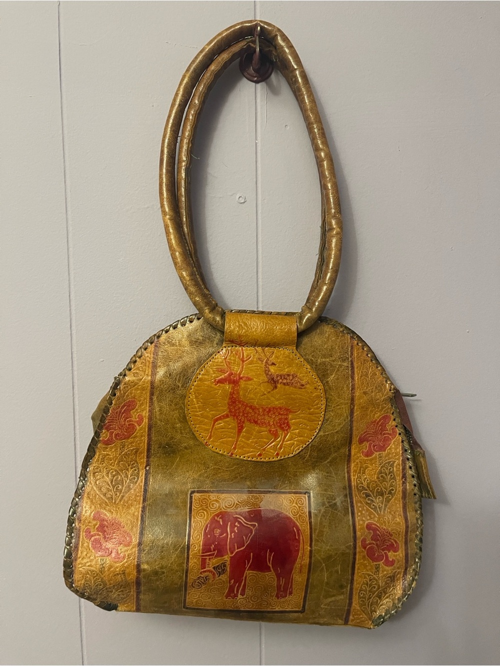 Vintage Brown Leather Handbag with Animal Motifs
